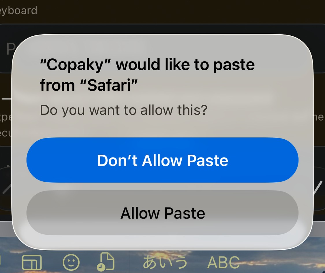 The iOS dialog asking for permission to paste