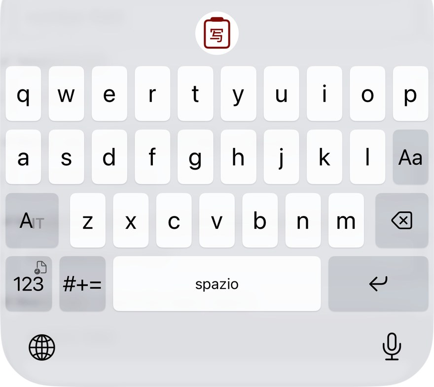 A small clipboard badge on the 123 key